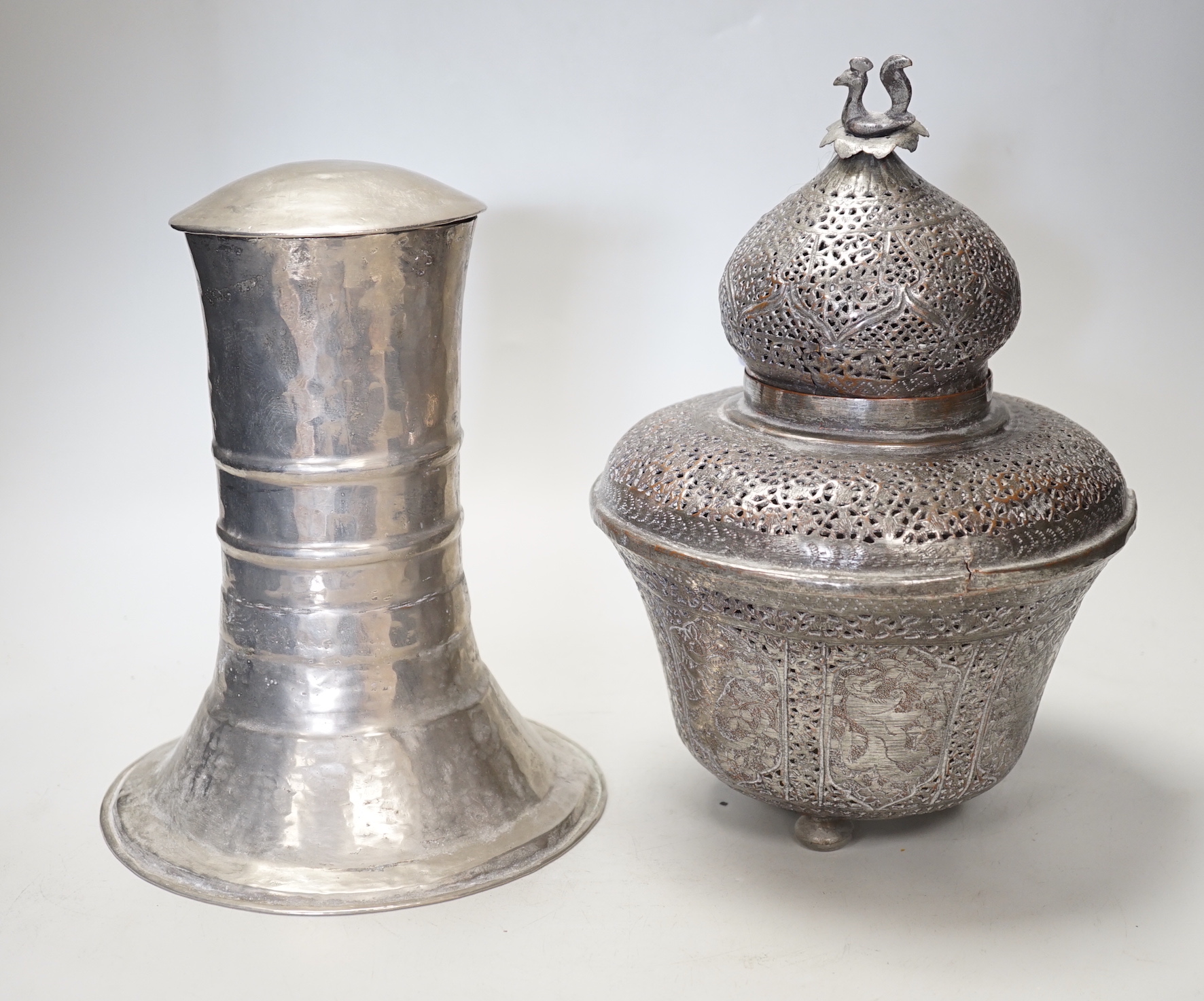 An Indian incense burner and a white metal lidded container, incense burner 29cm high